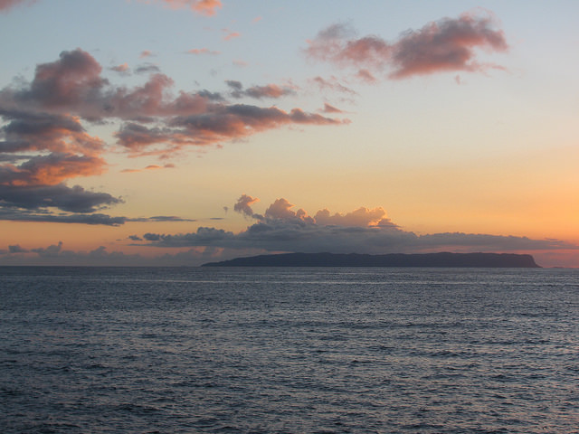 [Niʻihau at sunset] Photo by Forest & Kim Starr.