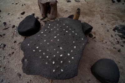 [Kōnane] Kōnane at Puʻuhonua o Hōnaunau. Photo by Ruben Carillo.