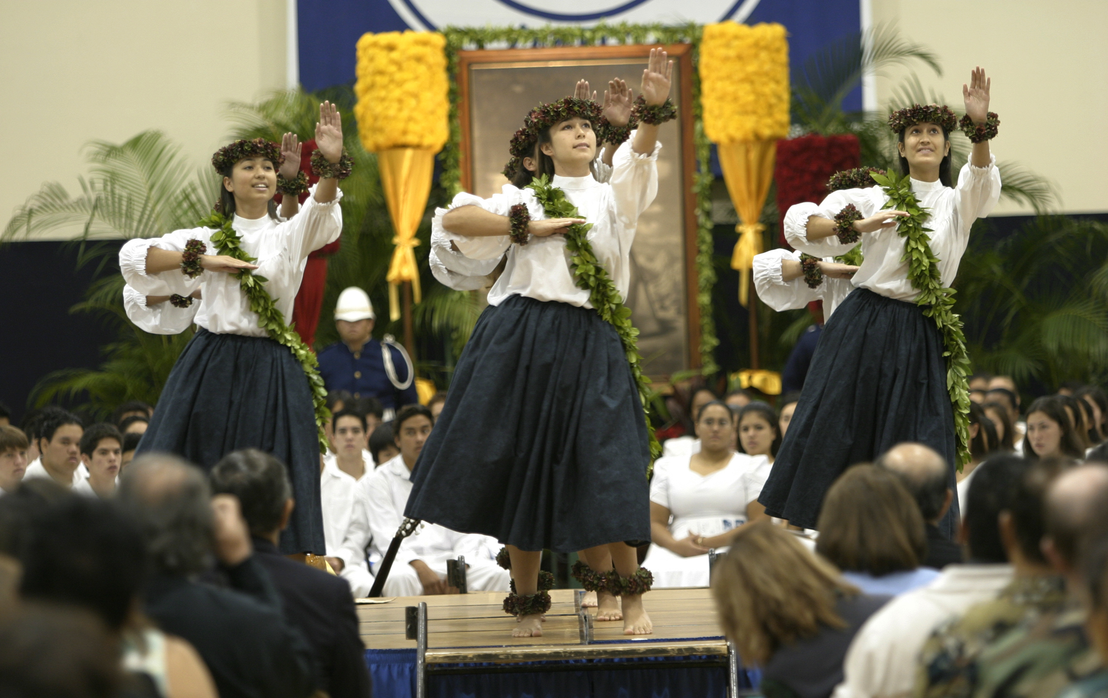 [Three hula dancers] Photo by Michael Young.